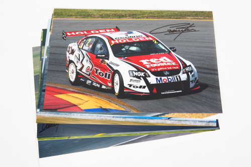 178 · GARTH TANDER: A group of 10, all signed, colour photographs of Garth Tander in various cars, all each individually signed by Tander, all 20cm high, 30cm wide