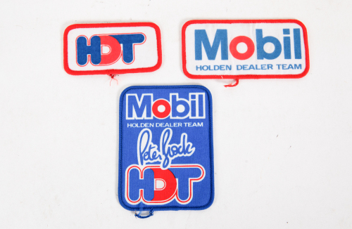 HDT: Three original late 1980s HDT cloth badges for Mobil HDT, largest 10cm high