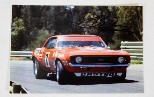 47 · BOB JANE: A signed photograph featuring Bob Jane driving Chev Camaro ZL1 circa early 1970s at Warwick Farm, signed by Jane, 20cm high, 30cm wide