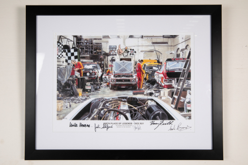 HDT: A signed print 'Birth Place of Legends - 1972 XU1' featuring Toranas in HDT workshop, signed by John Sheppard, Harry Firth, Colin Bond, mechanic Ian Tate & artisrt Mike Harbar, 45cm high, 57cm wide overall
