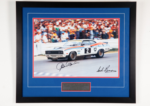 FORD: A signed photo featuring the Ford Falcon XC Hardtop at Bathurst 1977 with signatures from drivers Colin Bond & Alan Hamilton, 50cm high, 60cm wide overall