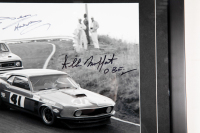 BEECHEY / MOFFAT: A signed b/w photograph featuring Norm Beechey chasing Allan Moffat at 1970 Round Two A.T.C.C at Bathurst, signed by Beechey & Moffat, 50cm high, 62cm wide overall - 2