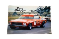 JANE / HARVEY: A signed photograph featuring Bob Jane driving Holden HQ Monaro at Calder c1973, signed by both Bob Jane & John Harvey, 20cm high, 30cm wide