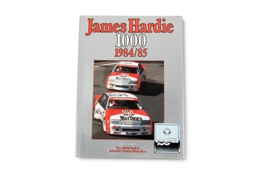 105 · JAMES HARDIE 1000: A signed copy of 'James Hardie 1000 - 1984/85' by Bill Tuckey, signed by Peter Brock & Larry Perkins, hardcover book, 1985