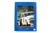 THE GREAT RACE: A signed copy of 'The Great Race - Tooheys 1000 - 1990', hardcover book with inserted photo signed by winner Allan Grice, published 1991 - 2