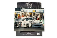 THE GREAT RACE: A signed copy of 'The Great Race - Tooheys 1000 - 1990', hardcover book with inserted photo signed by winner Allan Grice, published 1991 - 3