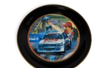 PETER BROCK: A decorative dinner plate set, each plate featuring the Peter Brock Bathurst wins, consists of 10 plates of differing sizes - 6