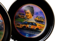 PETER BROCK: A decorative dinner plate set, each plate featuring the Peter Brock Bathurst wins, consists of 10 plates of differing sizes - 9