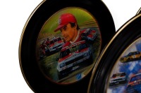 PETER BROCK: A decorative dinner plate set, each plate featuring the Peter Brock Bathurst wins, consists of 10 plates of differing sizes - 13