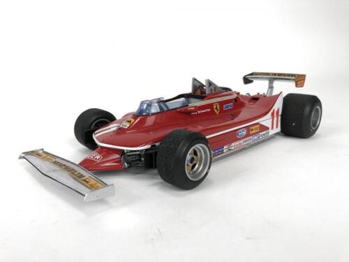 FERRARI: 1:18 scale Ferrari 312T4/T5 Formula 1 racing car produced by Exoto. (NB description)