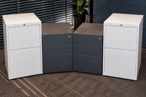 FILING CABINETS: Four small metal filing cabinets