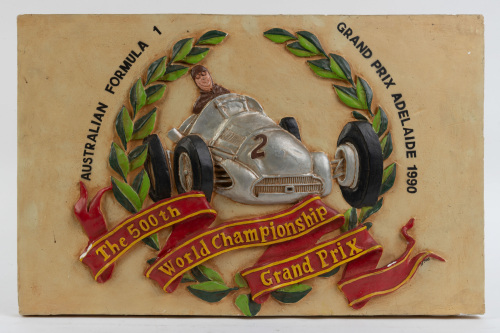 AUSTRALIAN GP: A commemorative cast wall display celebrating the 500th Formula One Grand Prix at Adelaide 1990, 354cm high, 55cm wide,