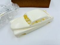 MERCURY: A 1:25 scale model kit of the 1949 Mercury Club Coupe by AMT with original packaging. - 4
