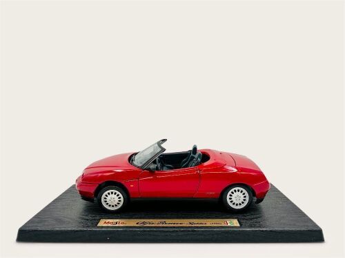 210 · ALFA ROMEO SPIDER: A 1:18 scale Alfa Romeo Spider by Maisto with original packaging [Location: Sydney]
