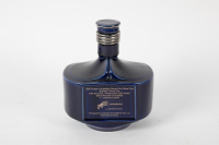 AUSTRALIAN GP: Two items to commemorate the Australian Grand Prix, includes an Adelaide racetrack ashtray, 25cm long and a 2002 Melbourne Port bottle (500ml) [Location: Melbourne] - 2
