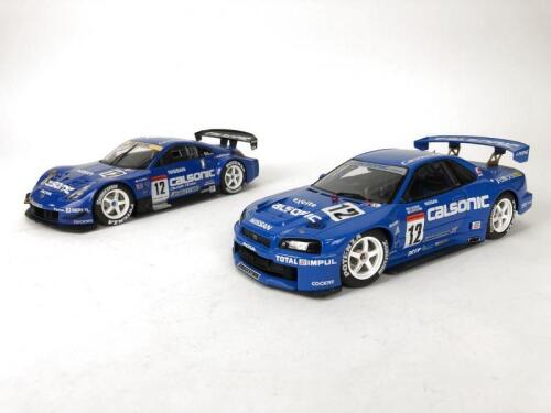 NISSAN: Pair of 1:18 scale Nissan racing cars produced by AutoArt. (NB description)