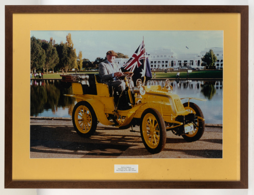 1901 CLEMENT: A large framed and glazed photograph of Peter Briggs on the Perth to Canberra Federation Rally 2001, competing in his 1901 Clement