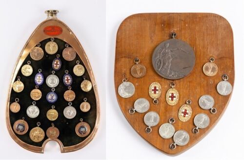 E.R.HALL: A group of medallions awarded to Edward Ramsden Hall (E.R. Hall) for various motoring events, one group mounted within an early brass Bugatti radiator surround [Location: Perth]