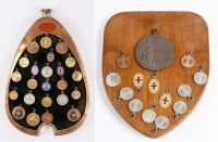 EDDIE HALL: A group of medallions awarded to famed Talbot, Bugatti, MG, Bentley driver Eddie Hall for various motoring events, one group mounted within an early brass Bugatti radiator surround [Location: Perth]