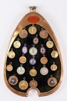EDDIE HALL: A group of medallions awarded to famed Talbot, Bugatti, MG, Bentley driver Eddie Hall for various motoring events, one group mounted within an early brass Bugatti radiator surround [Location: Perth] - 2