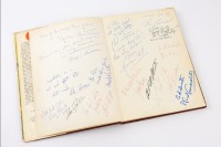 MEN AT THE WHEEL: A hardcover book by Peter Miller published by B. T. Batsford Ltd, inscribed and signed by various motor racing drivers and personalities including World Champions Graham Hill, Jack Brabham, Phil Hill and many others [Location: Perth] - 3