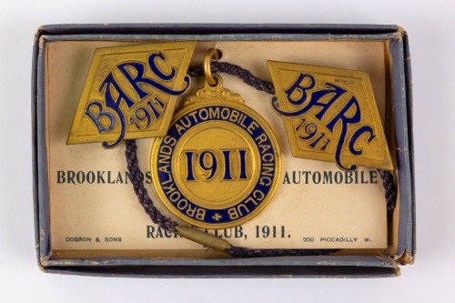 BROOKLANDS: A set of three 1911 Brooklands BARC lapel badges [Location: Perth]