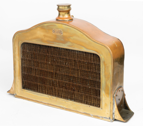 RADIATOR: A solid brass 'The Bartlett' (Australia) radiator, with full surround, core & cap, 48cm high, 67cm wide