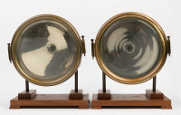 HEADLAMPS: A pair of large brass headlamps, lens width 23cm (9 inches), mounting bracket width 20cm, both mounted to timber bases [Location: Melbourne] - 2