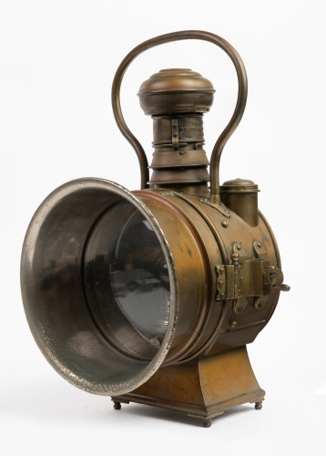 HEADLIGHT: A c1900 large 'The Polkey' (UK) brass headlight, design No. 401472, convex lens width 18.4cm (7 1/4 inches)