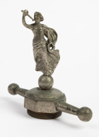 MASCOT: A c1920s/1930s nickel plated brass windswept maiden on dog-bone radiator cap, overall height 15cm [Location: Melbourne]