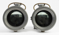 HEADLAMPS: Two large cast aluminum ECL branded headlamps, lens width 16.5cm, height to handle top 30cm, unit length 33cm [Location: Melbourne] - 2