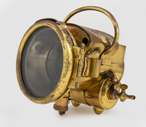 HEADLAMP: A c1900s B.R.C (France) No.10 brass headlamp, lens with 14cm, unit length 22cm