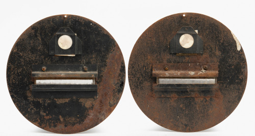 HEADLIGHT COVERS: Two WWII era headlight 'brownout' lens covers, with rippled lenses, both 20cm wide