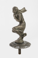 MASCOT: A 'crouching lady' mascot on radiator cap, 13cm high overall [Location: Melbourne]