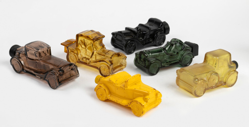 PERFUME BOTTLES: A group of six mostly Avon glass vintage car perfume bottles, all approx. 15-17cm long