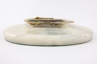 THUNDERBOLT: An original desk piece commemorating the historic World Land Speed Record of 357.5 mph (575.3 km/h) set by George Eyston in 'Thunderbolt' on September 16th, 1938 at Bonneville, Measures approximately 26cm long [Location: Perth] - 2