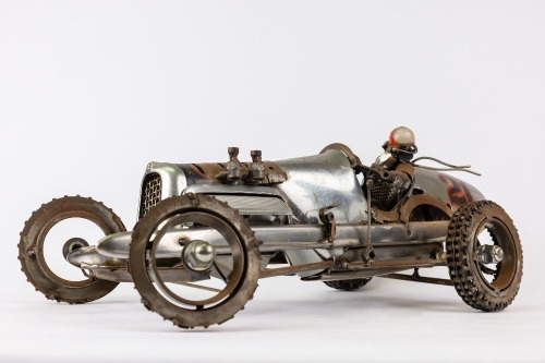 JAMES CORBETT: A finely crafted vintage racing car sculpture by automotive parts artist James Corbett [Location: Perth]