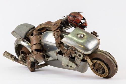 JAMES CORBETT: A finely crafted motorcyclist sculpture by automotive parts artist James Corbett [Location: Perth]