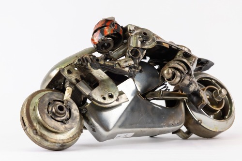 JAMES CORBETT: A finely crafted motorcyclist sculpture by automotive parts artist James Corbett [Location: Perth]