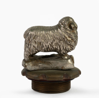 MASCOT: A mascot in the form of a ram affixed to a radiator cap, 11cm high overall, 8cm wide [Location: Melbourne] - 2