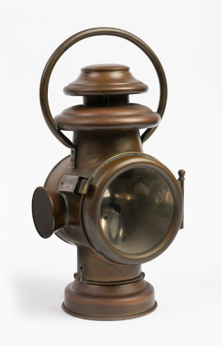 HEADLAMP: A c1900 / 1910s Auteroche (France) 'La Reflex' brass headlamp, lens width 8cm, lamp height 27cm