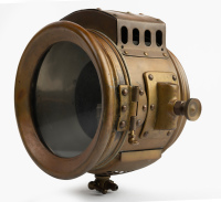 HEADLAMP: A Bristol Wagon & Carriage Works (UK) brass headlamp, lens width 12.5cm, mount bracket width 18cm [Location: Melbourne] - 2