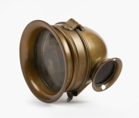 LAMP: A brass either spot or pillar lamp, lens width 9.5cm, 12cm long [Location: Melbourne]