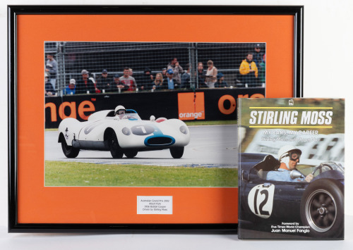 STIRLING MOSS / COOPER: A photograph of Stirling Moss driving a 1956 Cooper Bobtail at the 2002 Australian Grand Prix, framed & glazed, image 30cm high, 45cm wide