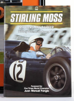 STIRLING MOSS / COOPER: A photograph of Stirling Moss driving a 1956 Cooper Bobtail at the 2002 Australian Grand Prix, framed & glazed, image 30cm high, 45cm wide [Location: Melbourne] - 2