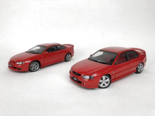 HOLDEN: Pair of 1:18 scale Holden cars produced by AutoArt. (NB description)