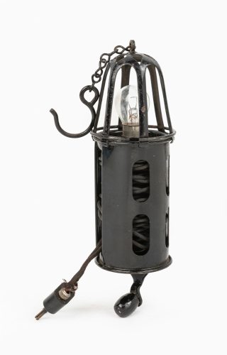 INSPECTION LIGHT: A c1950s or 1960s 'birdcage' inspection lamp, 16cm long [Location: Melbourne]