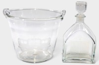 CRYSTAL WARE: Two items of crystal wear including an ice bucket by Tiffany and Co with an etched front of a Rolls-Royce with a license plate marked 'XMAS 75', along with a decanter with etched Rolls-Royce grille [Location: Melbourne]