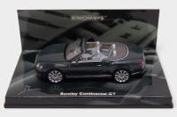 BENTLEY: A 1:43 scale Minichamps Bentley Continental GT model, finished in dark green paintwork, model number 436 139020 [Location: Melbourne]