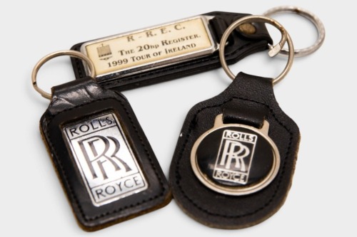 KEY RINGS: Three Rolls-Royce keyrings on leather tags, including 'R.R.E.C The 20hp Register 1999 Tour of Ireland' keyring [Location: Melbourne]